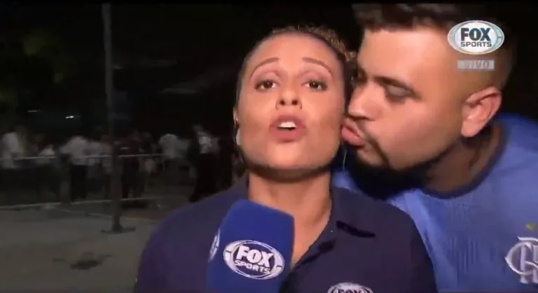 Flamenguista tenta beijar repórter ao vivo antes do Fla-Flu; assista