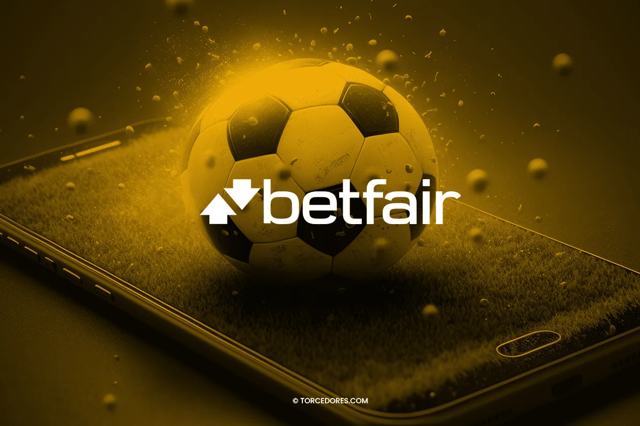 Imagem promocional Betfair em tons sépia: bola de futebol sobre celular.