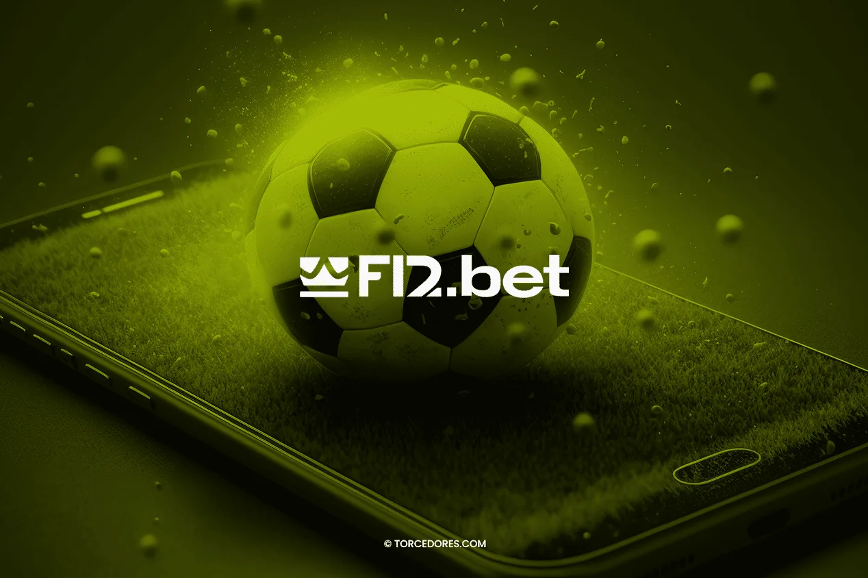 Imagem promocional com logotipo da F12.bet contra fundo em tons sépia: bola de futebol sobre celular. 
