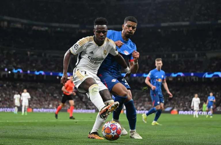 Real Madrid marca com Vinícius Júnior, empata com Red Bull Leipzig e avança na Champions