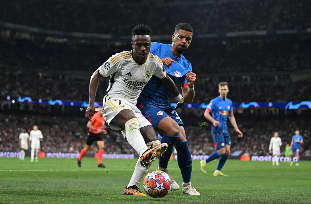 Real Madrid marca com Vinícius Júnior, empata com Red Bull Leipzig e avança na Champions