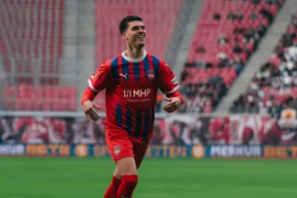 Na imagem, jogador do Heidenheim comemora gol