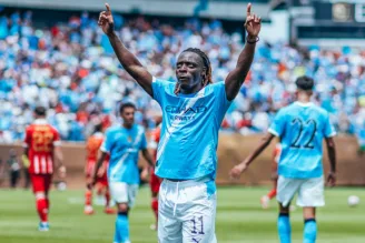 Doku comemora o segundo gol do Manchester City